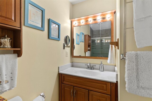 7276 21st St N, Saint Petersburg, FL 33702 - full bathroom with vanity, a shower stall, and toilet