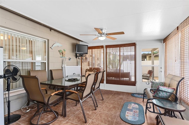 7276 21st St N, Saint Petersburg, FL 33702 - dining room featuring ceiling fan and tile patterned floors