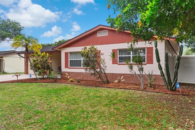 7276 21st St N, Saint Petersburg, FL 33702 - single story home featuring a front lawn