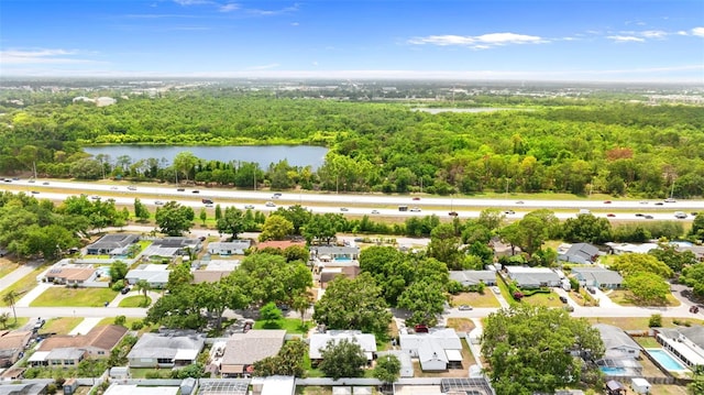7276 21st St N, Saint Petersburg, FL 33702 - aerial view of residential area with a forest and a large body of water
