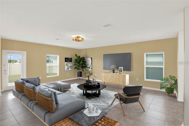 271 Inman Blvd, Winter Haven, FL 33881 - tiled living area featuring baseboards