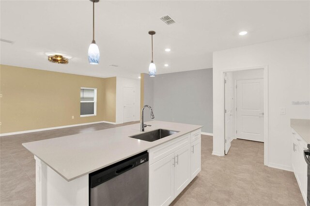 271 Inman Blvd, Winter Haven, FL 33881 - kitchen with dishwasher, a sink, white cabinets, light countertops, and recessed lighting