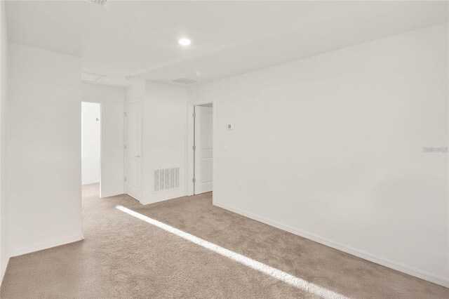 271 Inman Blvd, Winter Haven, FL 33881 - unfurnished room with carpet, recessed lighting, and baseboards