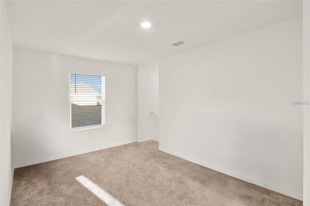 271 Inman Blvd, Winter Haven, FL 33881 - unfurnished room with carpet, baseboards, and recessed lighting