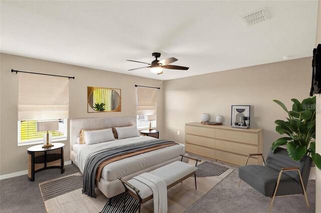 271 Inman Blvd, Winter Haven, FL 33881 - bedroom featuring baseboards, a ceiling fan, and light colored carpet