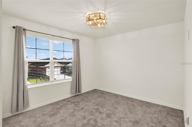 271 Inman Blvd, Winter Haven, FL 33881 - empty room with carpet floors and baseboards