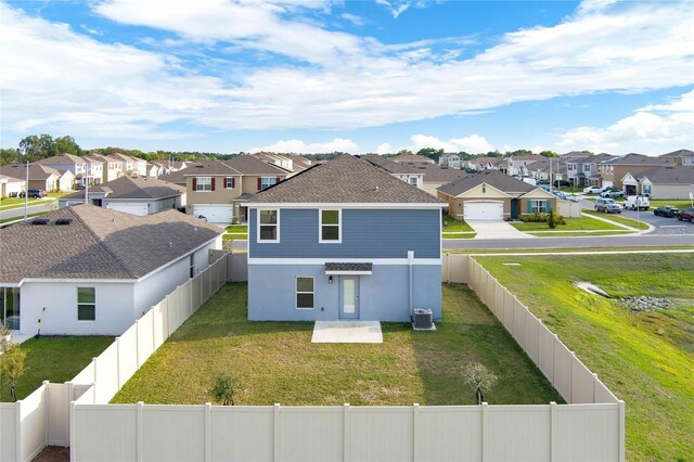 271 Inman Blvd, Winter Haven, FL 33881 - rear view of property with a residential view, central air condition unit, and stucco siding
