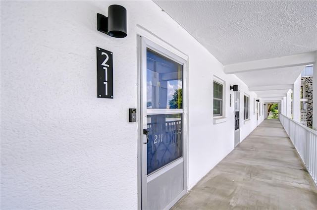 4801 Airport Rd Unit 211, Zephyrhills, FL 33542 - view of exterior entry with stucco siding