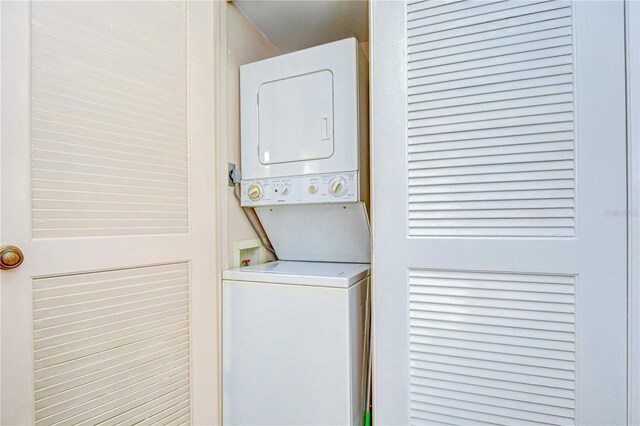 4801 Airport Rd Unit 211, Zephyrhills, FL 33542 - laundry area with estacked washer and dryer