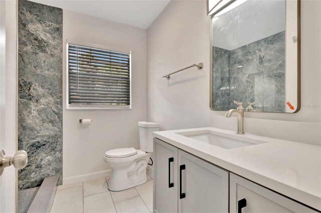 4714 W Vasconia St, Tampa, FL 33629 - bathroom featuring vanity, tile patterned flooring, and a shower