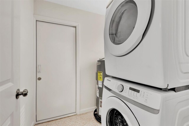 4714 W Vasconia St, Tampa, FL 33629 - washroom with estacked washer and dryer and water heater