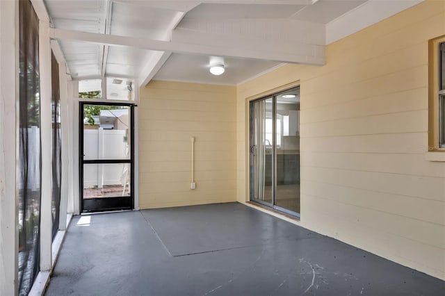 4714 W Vasconia St, Tampa, FL 33629 - unfurnished sunroom featuring plenty of natural light and beam ceiling