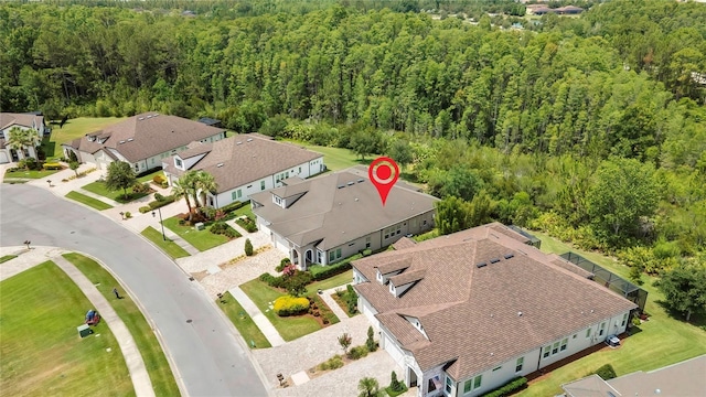 4155 Barletta Ct, Wesley Chapel, FL 33543 - aerial perspective of suburban area featuring a heavily wooded area