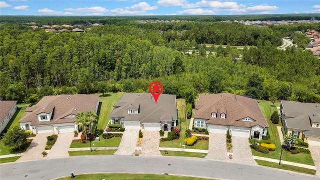 4155 Barletta Ct, Wesley Chapel, FL 33543 - aerial perspective of suburban area featuring a heavily wooded area