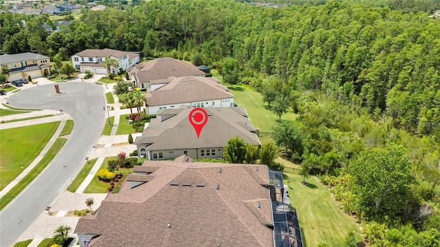 4155 Barletta Ct, Wesley Chapel, FL 33543 - aerial view of residential area featuring a heavily wooded area