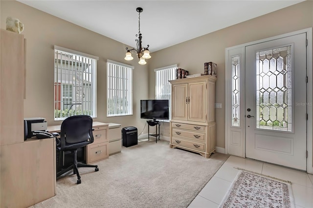 4155 Barletta Ct, Wesley Chapel, FL 33543 - office featuring a chandelier, baseboards, light tile patterned floors, and light carpet