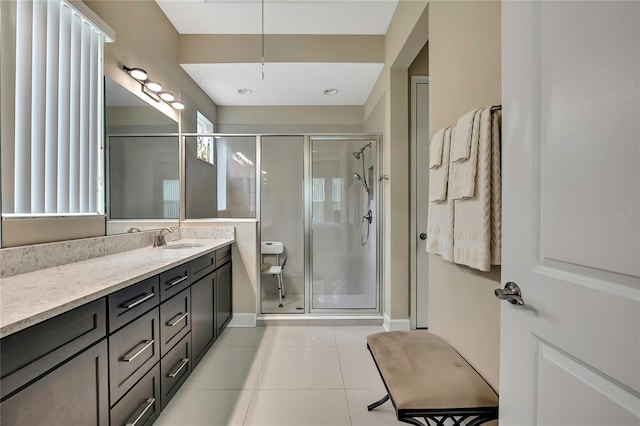 4155 Barletta Ct, Wesley Chapel, FL 33543 - full bathroom with vanity, tile patterned floors, a shower stall, toilet, and baseboards