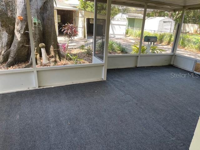 15034 Lake Magdalene Blvd, Tampa, FL 33618 - view of unfurnished sunroom