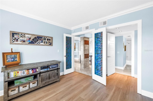 4900 Brittany Dr S Unit 611, Saint Petersburg, FL 33715 - interior space featuring ornamental molding and wood finished floors