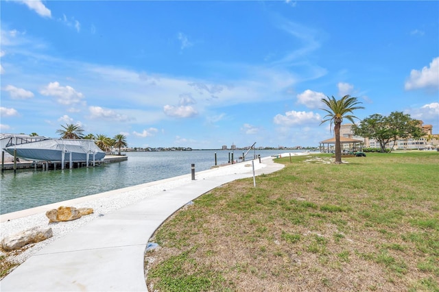 4900 Brittany Dr S Unit 611, Saint Petersburg, FL 33715 - dock with a lawn and a water view