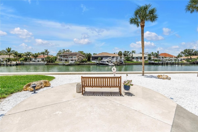 4900 Brittany Dr S Unit 611, Saint Petersburg, FL 33715 - view of home's community with a water view, a residential view, and a patio area