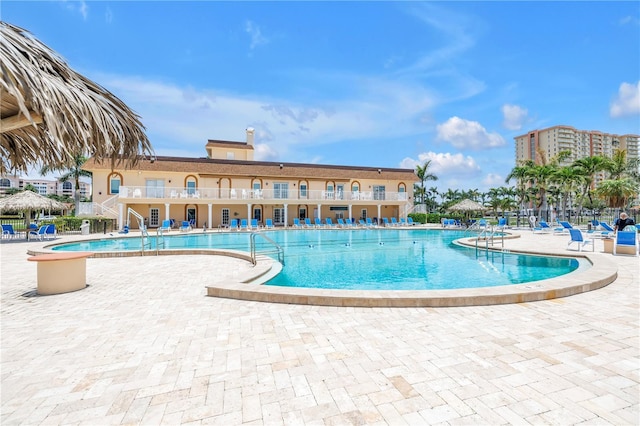 4900 Brittany Dr S Unit 611, Saint Petersburg, FL 33715 - community pool featuring a patio and stairway