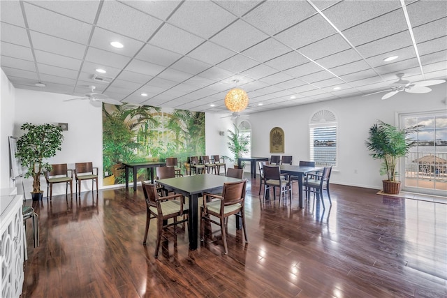 4900 Brittany Dr S Unit 611, Saint Petersburg, FL 33715 - dining room with ceiling fan, wood finished floors, a paneled ceiling, and recessed lighting