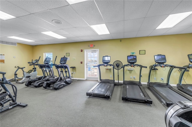 4900 Brittany Dr S Unit 611, Saint Petersburg, FL 33715 - workout area with a paneled ceiling and baseboards