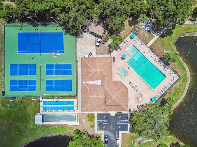 6630 Spring Flower Dr Unit 14, New Port Richey, FL 34653 - drone / aerial view of a pool area and a nearby body of water
