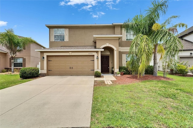 12316 Streambed Dr, Riverview, FL 33579 - view of front of home with stucco siding, driveway, a front lawn, and an attached garage