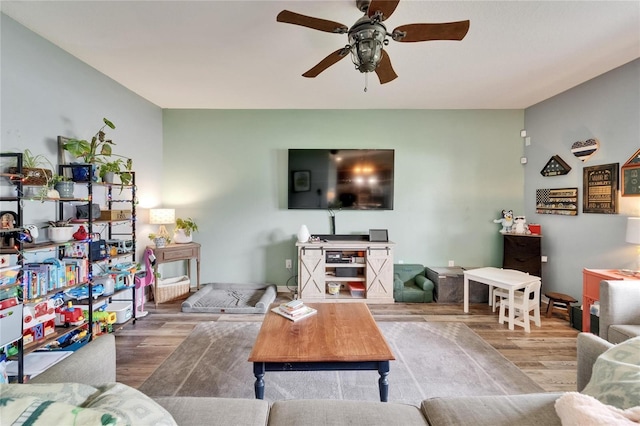 12316 Streambed Dr, Riverview, FL 33579 - living area featuring wood finished floors and ceiling fan