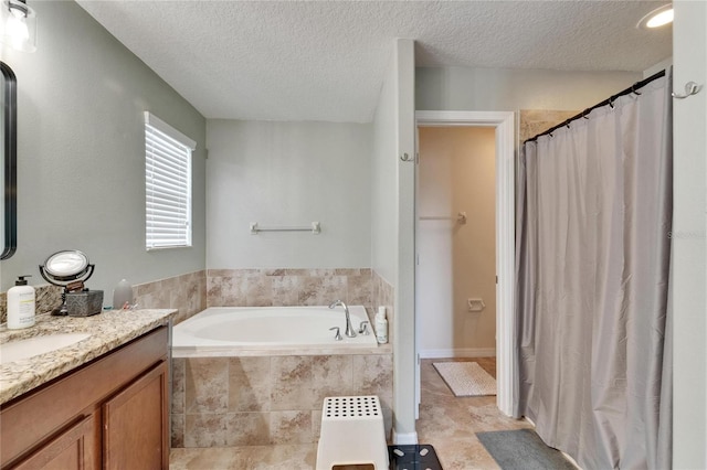 12316 Streambed Dr, Riverview, FL 33579 - full bath featuring vanity, a garden tub, a textured ceiling, and a shower with curtain