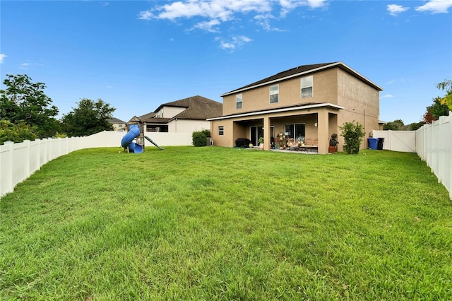 12316 Streambed Dr, Riverview, FL 33579 - rear view of property featuring a patio area and stucco siding