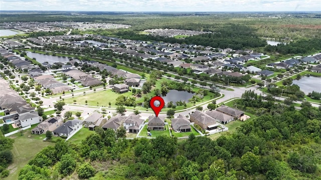 12316 Streambed Dr, Riverview, FL 33579 - aerial overview of property's location featuring a nearby body of water, nearby suburban area, and a heavily wooded area