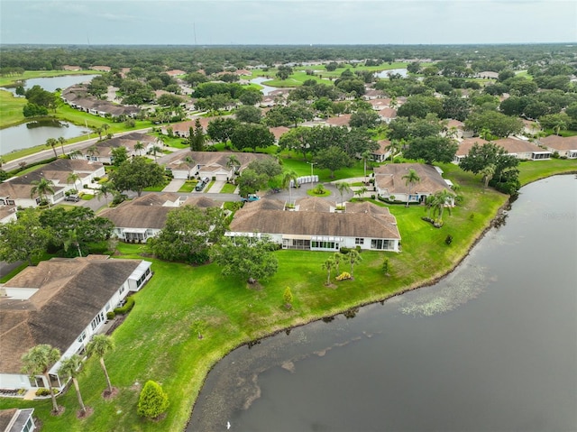 1012 Radison Lake Ct Unit 59, Sun City Center, FL 33573 - aerial perspective of suburban area with a large body of water
