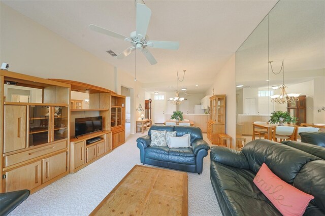 1012 Radison Lake Ct Unit 59, Sun City Center, FL 33573 - living room with a chandelier, carpet, and a ceiling fan