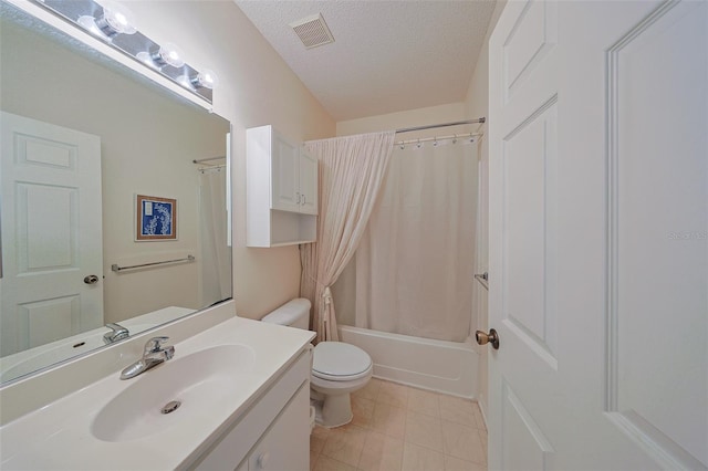 1012 Radison Lake Ct Unit 59, Sun City Center, FL 33573 - bathroom with toilet, vanity, a textured ceiling, and shower / bathtub combination with curtain