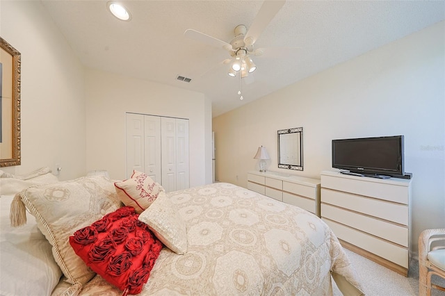 1012 Radison Lake Ct Unit 59, Sun City Center, FL 33573 - bedroom featuring a closet, carpet, and a ceiling fan