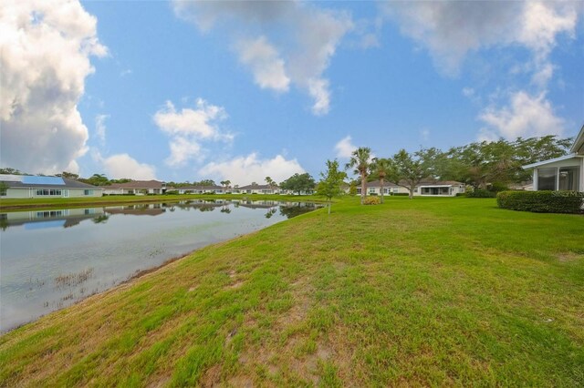 1012 Radison Lake Ct Unit 59, Sun City Center, FL 33573 - water view with nearby suburban area