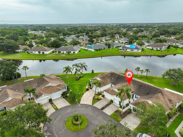 1012 Radison Lake Ct Unit 59, Sun City Center, FL 33573 - aerial perspective of suburban area with a large body of water
