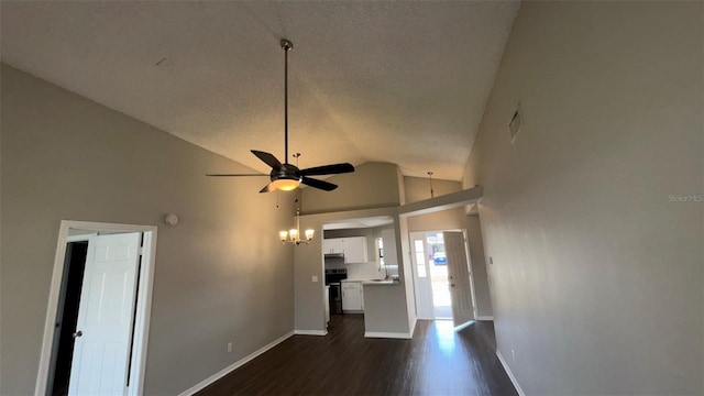 12804 Millridge Forest St, Tampa, FL 33624 - unfurnished living room featuring ceiling fan, a sink, baseboards, dark wood-style floors, and high vaulted ceiling