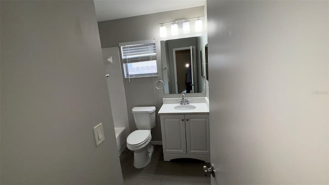12804 Millridge Forest St, Tampa, FL 33624 - full bathroom featuring vanity, toilet, tile patterned floors, and shower / washtub combination