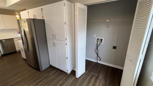 12804 Millridge Forest St, Tampa, FL 33624 - kitchen featuring stainless steel appliances, dark wood-style floors, white cabinets, light countertops, and baseboards