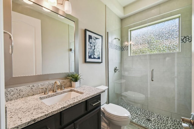 9080 Morgana Ct, Winter Garden, FL 34787 - bathroom with toilet, a stall shower, and vanity
