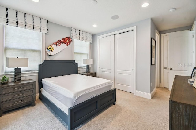 9080 Morgana Ct, Winter Garden, FL 34787 - bedroom with light carpet, a closet, baseboards, and recessed lighting
