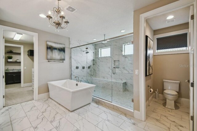 9080 Morgana Ct, Winter Garden, FL 34787 - bathroom with marble finish flooring, a soaking tub, a marble finish shower, baseboards, and toilet