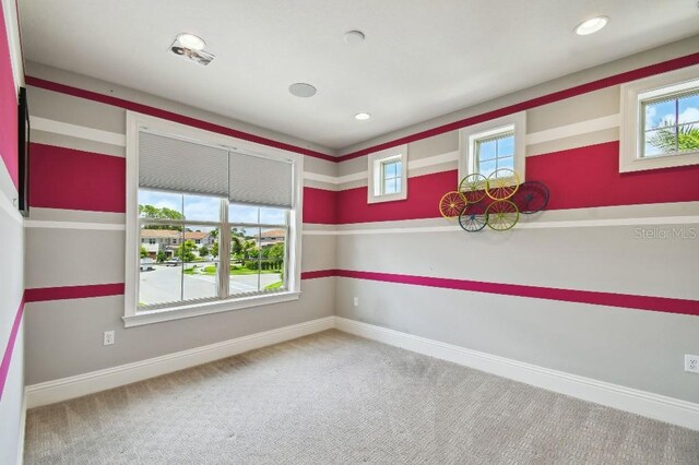 9080 Morgana Ct, Winter Garden, FL 34787 - spare room with baseboards, carpet, and recessed lighting