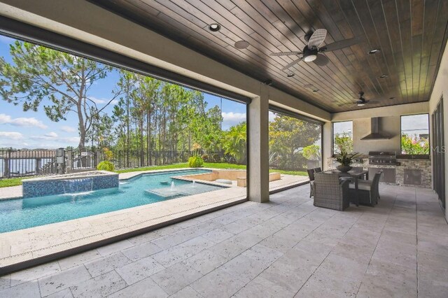 9080 Morgana Ct, Winter Garden, FL 34787 - view of pool with an in-ground hot tub, a fenced backyard, ceiling fan, a patio, and outdoor dining space