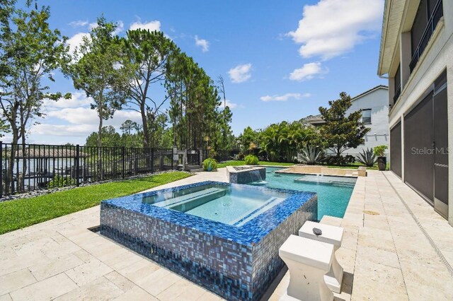 9080 Morgana Ct, Winter Garden, FL 34787 - view of pool featuring a patio and a pool with connected hot tub