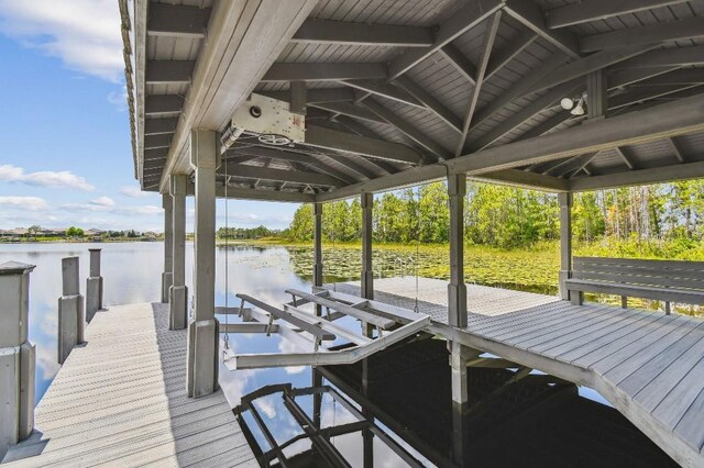 9080 Morgana Ct, Winter Garden, FL 34787 - dock area featuring boat lift and a water view